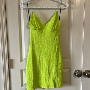 Bright green mini dress.
